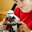 depositphotos_10182996-stock-photo-girl-examining-preparation-under-the-105×150