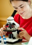 depositphotos_10182996-stock-photo-girl-examining-preparation-under-the-105×150